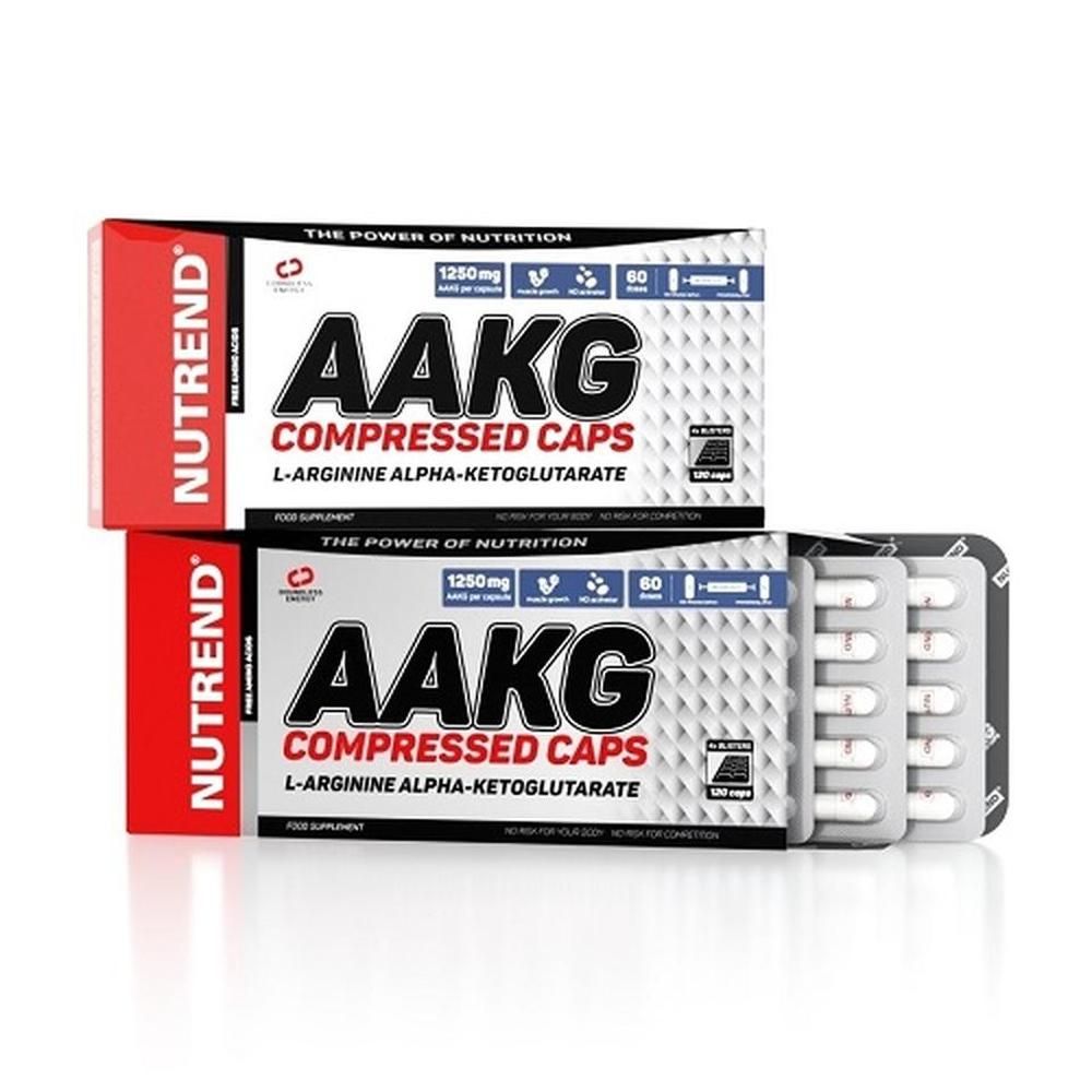 Zwei Schachteln mit Kapseln. Aufschrift AAKG Compressed Caps, L-Arginin Alpha-Ketoglutarat. Marke Nutrend.