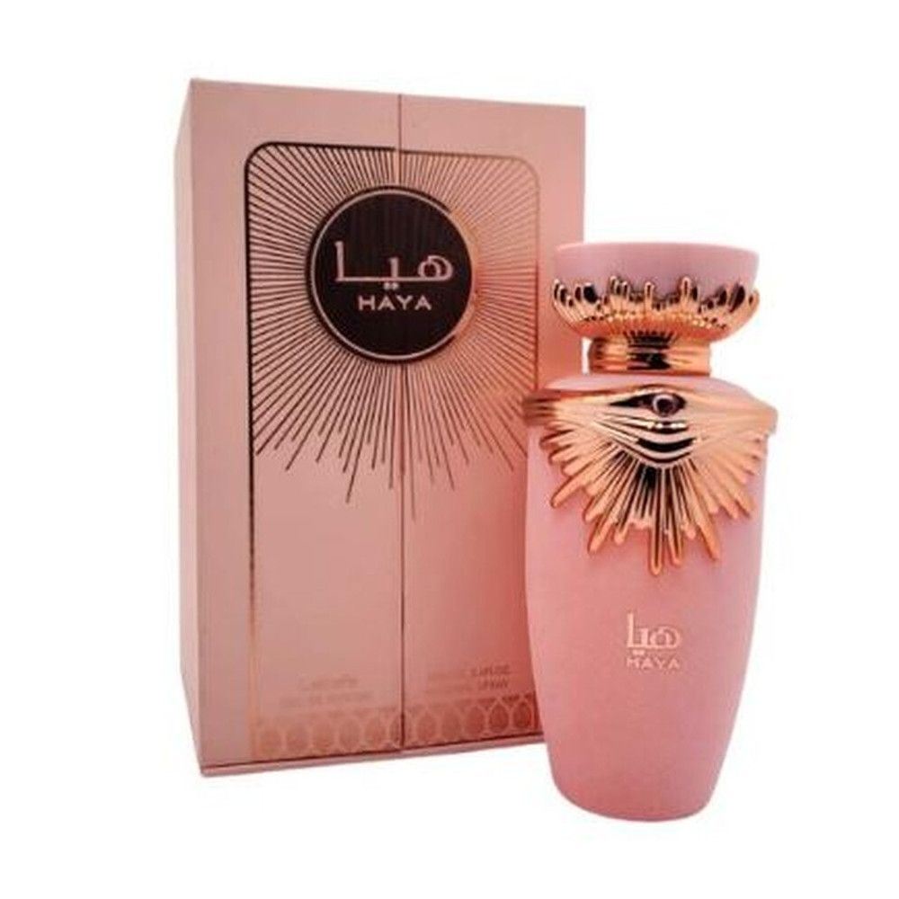 Rosa Flakon und Verpackung. Goldene Verzierungen und Aufschrift "Haya".