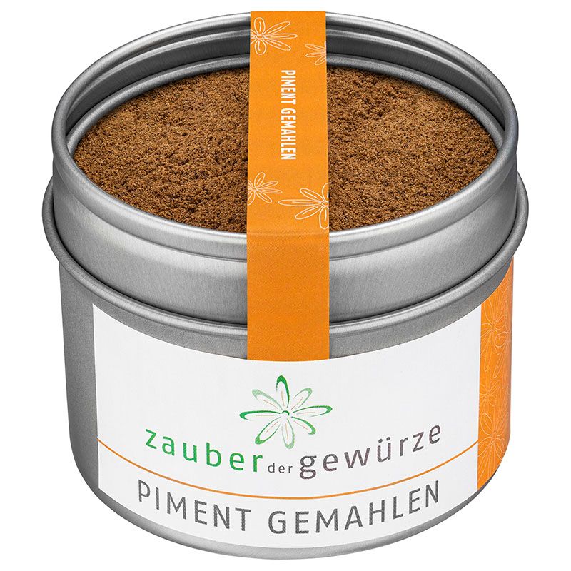 Runde Dose mit Piment gemahlen. Weißes Etikett mit Schriftzug 'Zauber der Gewürze' und 'Piment gemahlen'. Orangefarbener Streifen mit Produktname.