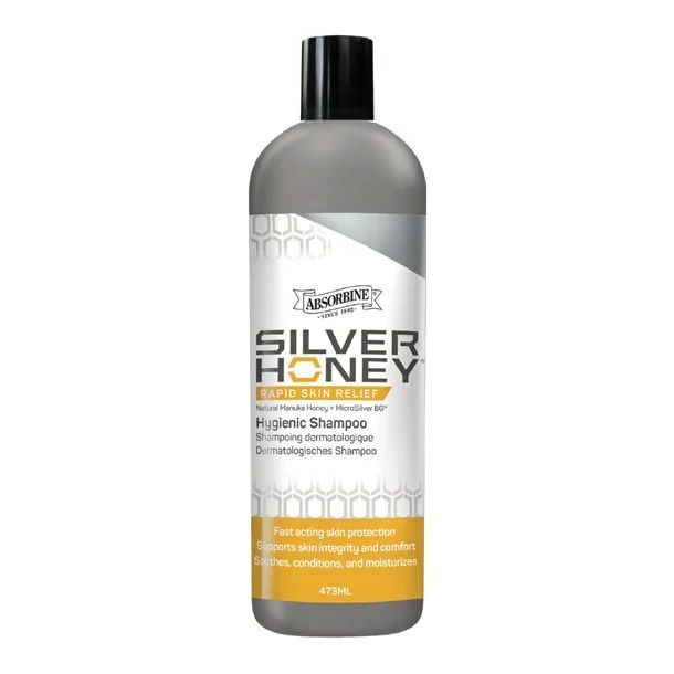 Graue Flasche mit schwarzem Deckel. Etikett mit Produktnamen und Text. 473ml.