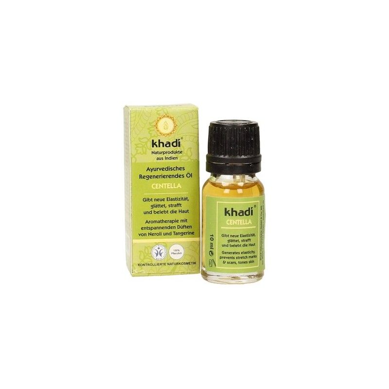 Khadi Centella Öl-Fläschchen und Schachtel. Grün-gelbe Verpackung. Schwarzer Deckel. Text: Centella, 10 ml.