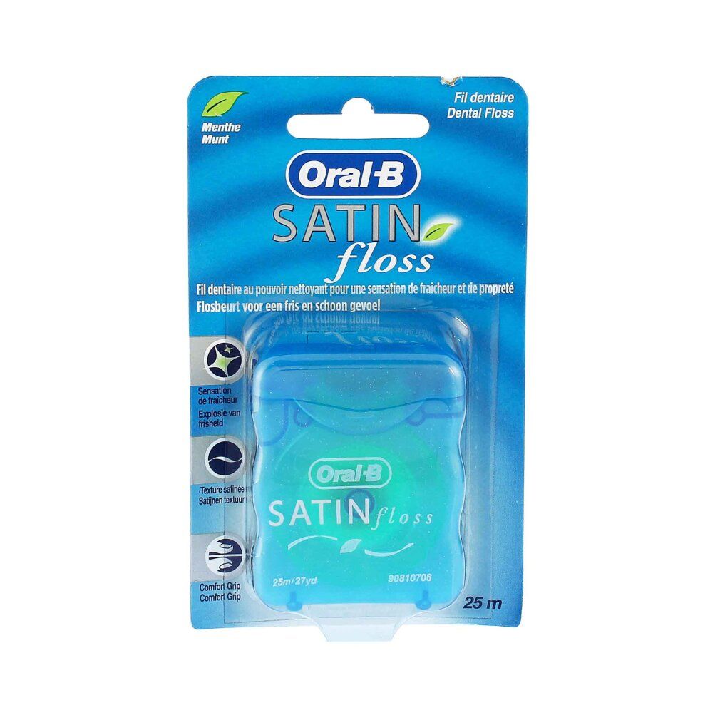 Blisterkarte mit blauem Zahnseide-Behälter. Aufschrift: Oral-B Satin Floss. 25 m.
