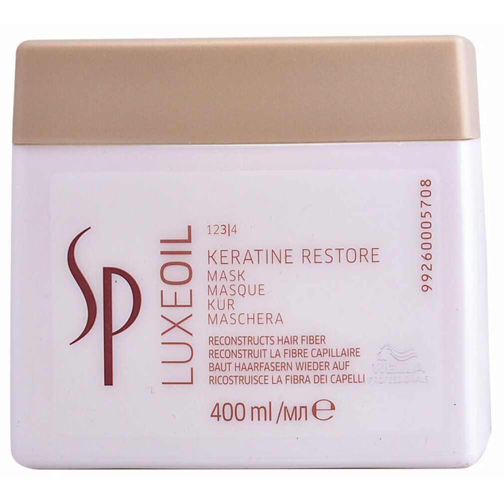 Weißer Tiegel mit goldfarbenem Deckel. Aufschrift: SP Luxeoil Keratin Restore Mask. 400 ml.