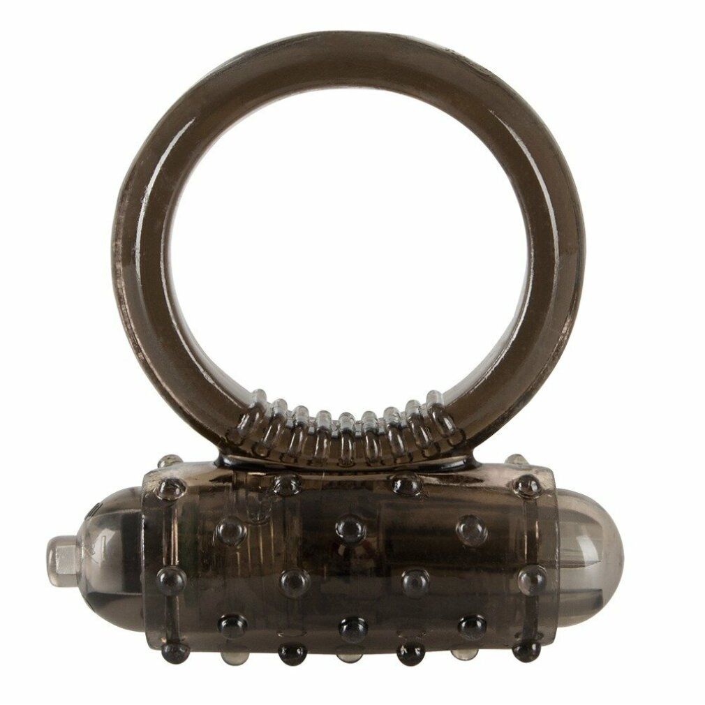 Schwarzer Penisring mit Vibrationsfunktion. Ring und Vibrationsaufsatz mit Noppen.