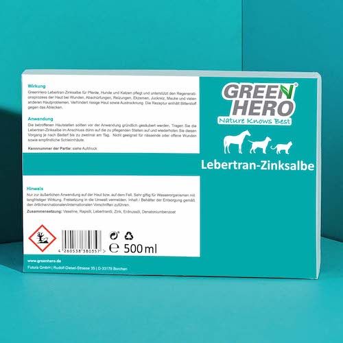 Verpackung mit Text und Logo: GREEN HERO, Lebertran-Zinksalbe. Inhaltsstoffe, Anwendungshinweise. Volumen: 500 ml.