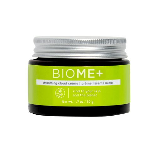 Glas mit Creme BIOME+. Grüne Etikette mit Text. Silberner Deckel. Schwarzer Behälter.