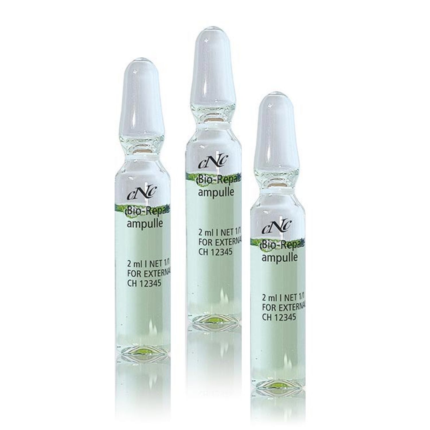 Drei Glasampullen mit weißem Verschluss. Aufschrift: CNC Bio-Repairampulle, 2 ml, für externe Anwendung. Grüner Streifen mit Text.