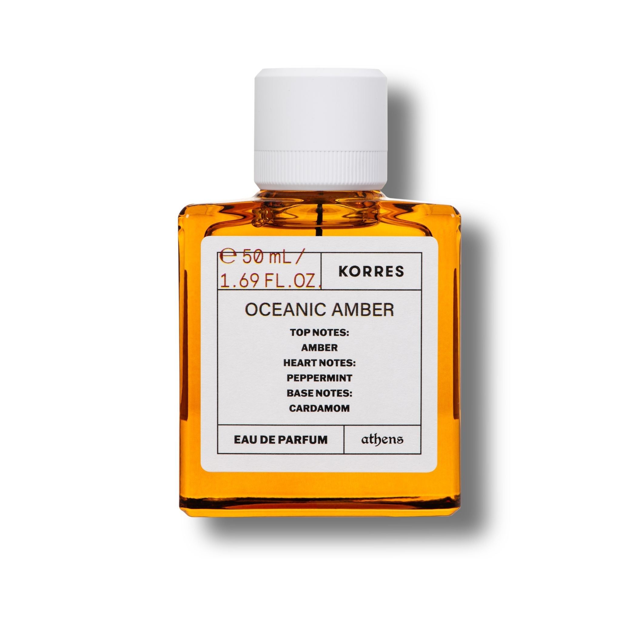 KORRES Eau de Parfum Oceanic Amber. Eckiger Glasflakon mit weißem Deckel. Etikett mit Produktinformationen. 50 ml.