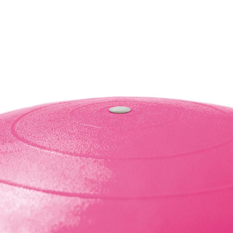 Nahaufnahme eines pinkfarbenen Gymnastikballs. Ein weißer Verschluss ist sichtbar.