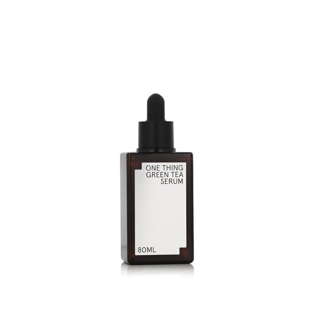 Braune Glasflasche mit schwarzem Deckel und Pipette. Aufschrift: ONE THING GREEN TEA SERUM. Volumen: 80ml.