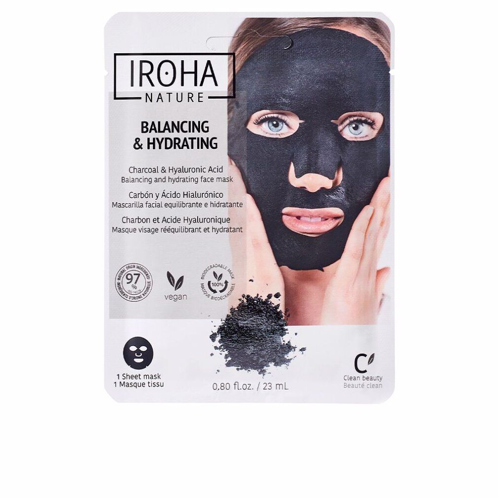 Gesichtsmaske in Verpackung. Aufdruck: Balancing & Hydrating, Iroha Nature. Vegan-Siegel. Schwarzes Maskenpulver.