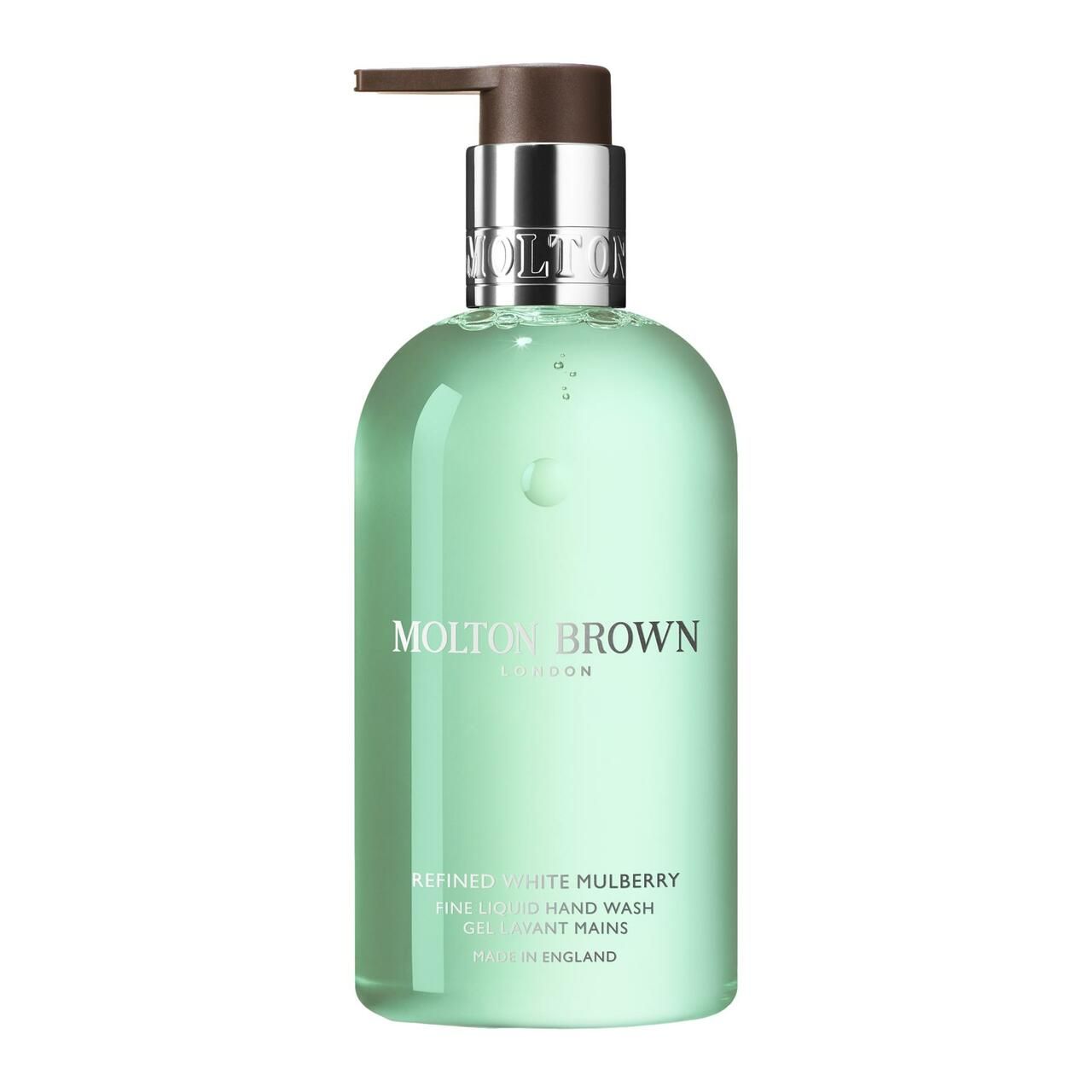 Grüne Flüssigseife mit Pumpe. Aufschrift: Molton Brown, Refined White Mulberry, Fine Liquid Hand Wash. Hergestellt in England.