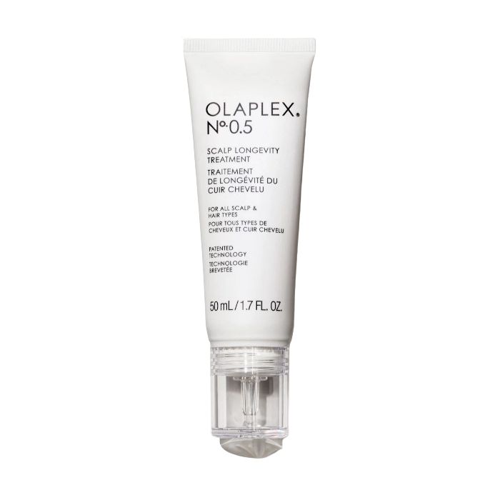 Weiße Tube mit Produktbezeichnung und Text. Klare, transparente Applikatorspitze. 50 ml/1.7 FL. OZ.