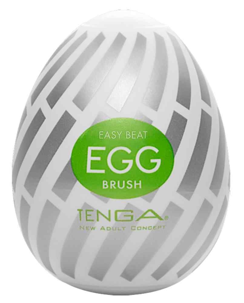 Weißes Ei mit grau-weißem Streifenmuster und grünem Aufkleber mit der Aufschrift "EGG BRUSH". Marke TENGA.