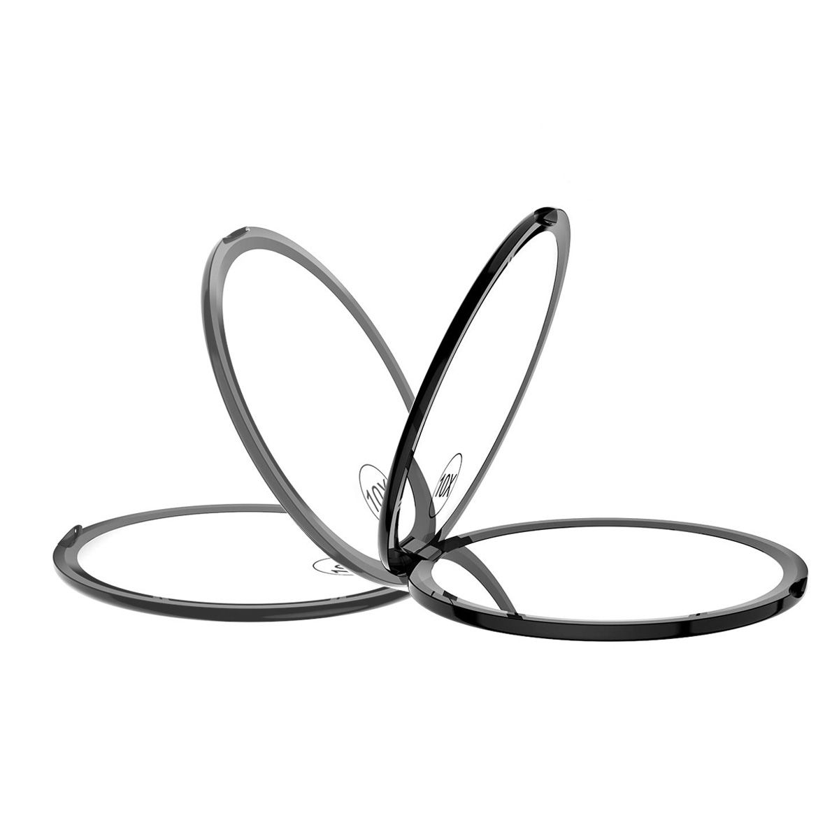 Mehrere schwarze, runde Kosmetikspiegel-Rahmen, teilweise überlappend. Spiegel sind nicht sichtbar.