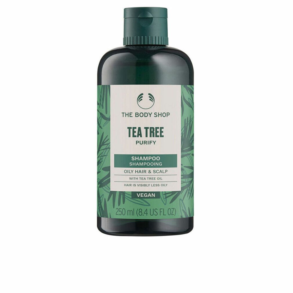 Grüne Shampoo-Flasche. Aufschrift: Tea Tree, Shampoo, für fettiges Haar und Kopfhaut. Vegan. 250 ml.