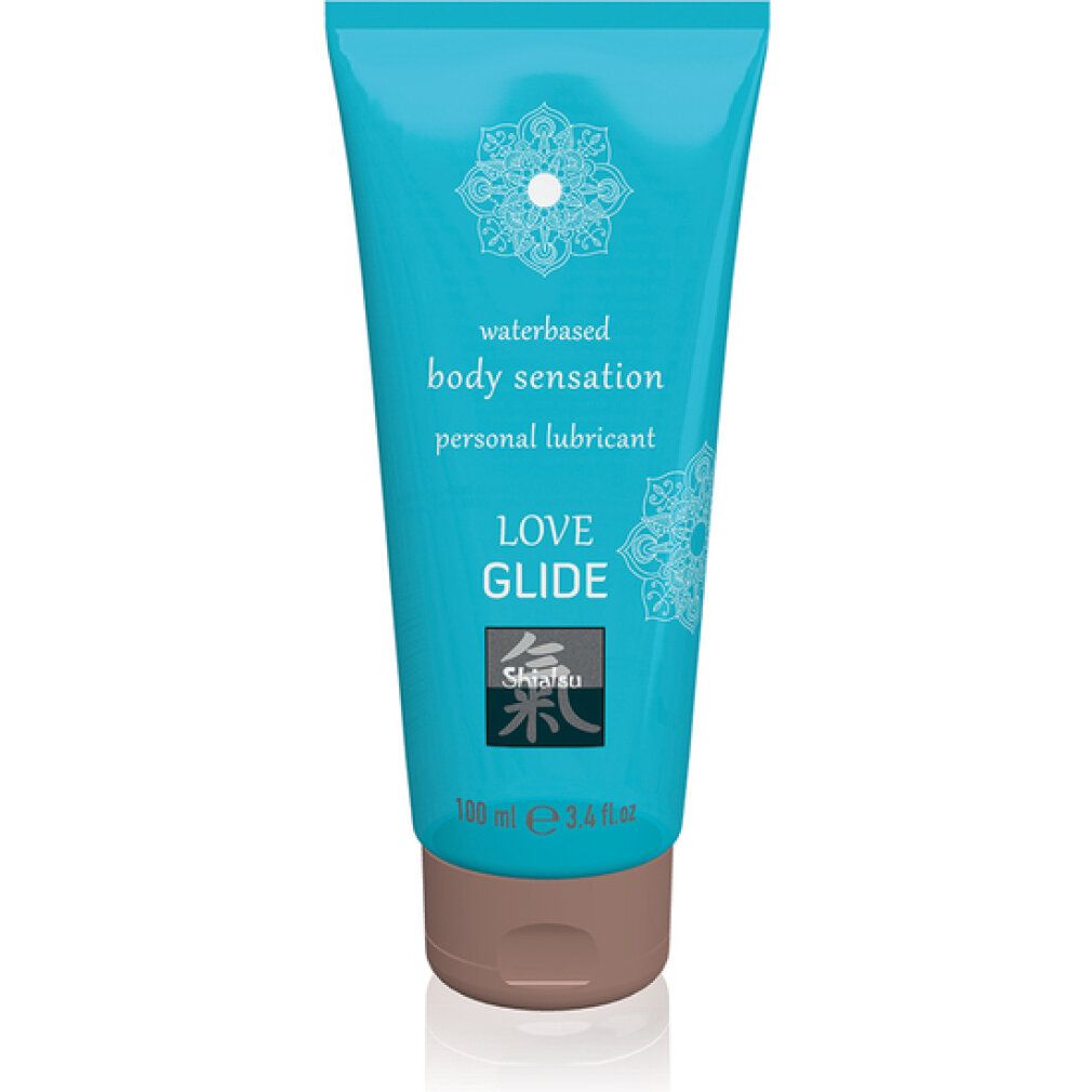 Türkisfarbene Tube mit braunem Verschluss. Aufschrift: "waterbased body sensation personal lubricant LOVE GLIDE Shiatsu".