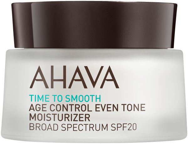 AHAVA Age Control Even Tone Moisturizer mit LSF20 in einem weißen Tiegel mit braunem Deckel.