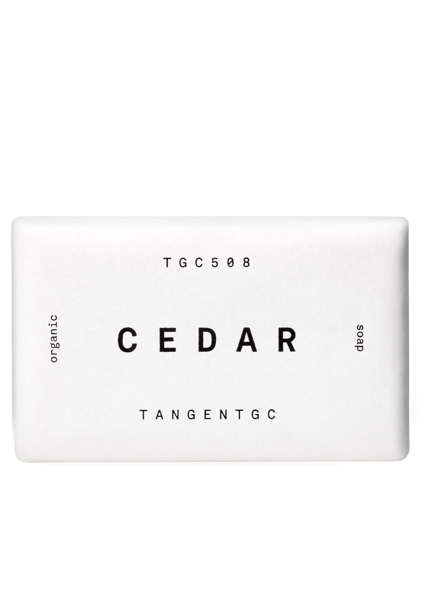 Rechteckige Seife mit weißer Verpackung. Aufschrift: CEDAR, TANGENT GC, organic, soap.