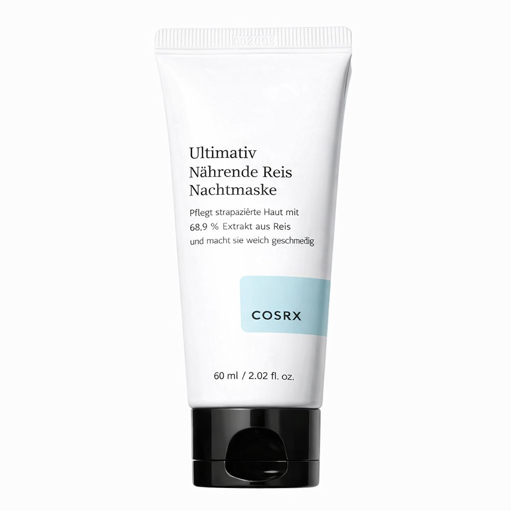 Weiße Tube mit schwarzem Deckel. Aufschrift: Ultimativ Nährende Reis Nachtmaske. Marke: COSRX. 60 ml / 2.02 fl. oz.
