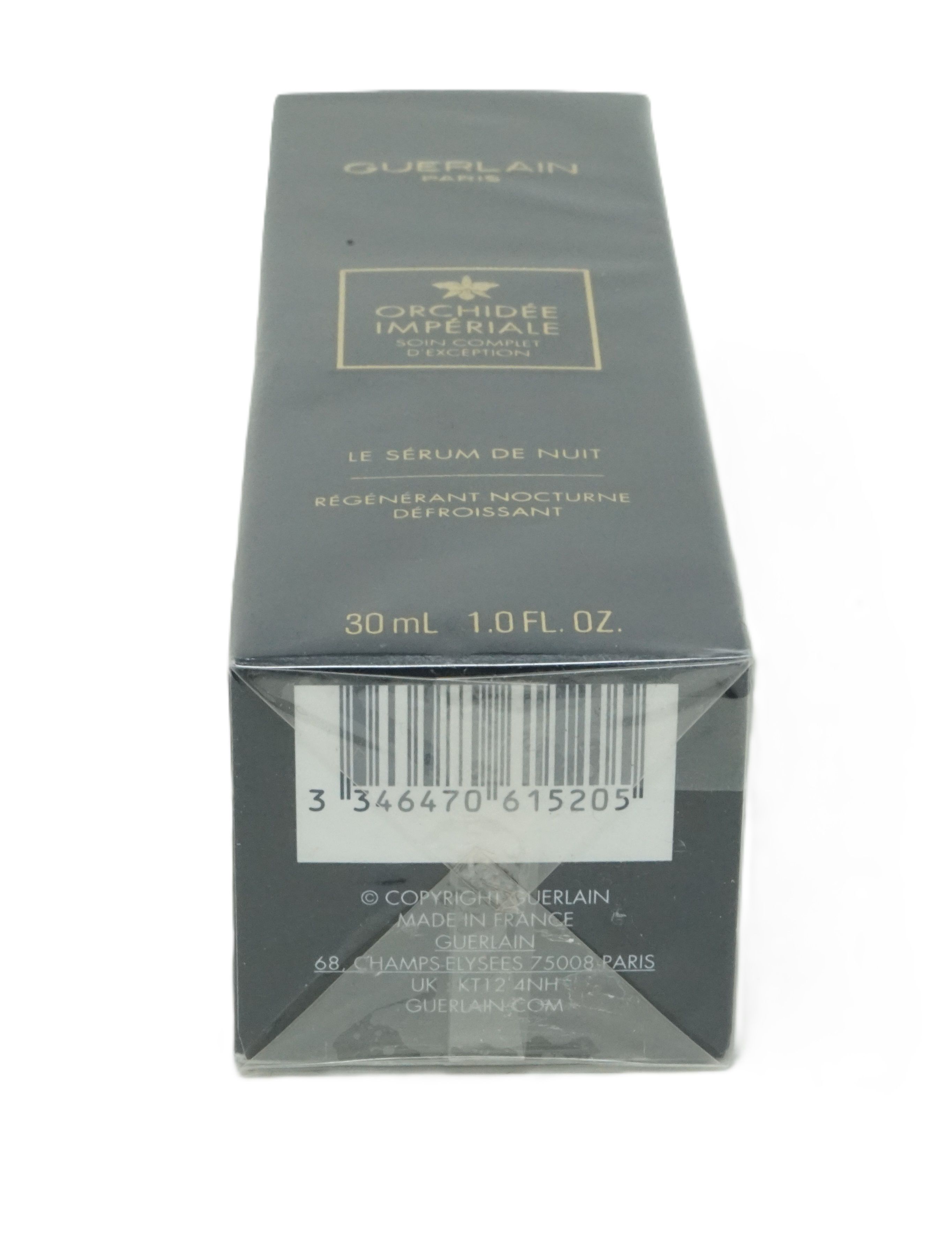 Schwarze Verpackung mit Produktinformationen. Marke Guerlain, Orchidée Impériale, Le Sérum de Nuit. Barcode und Text.