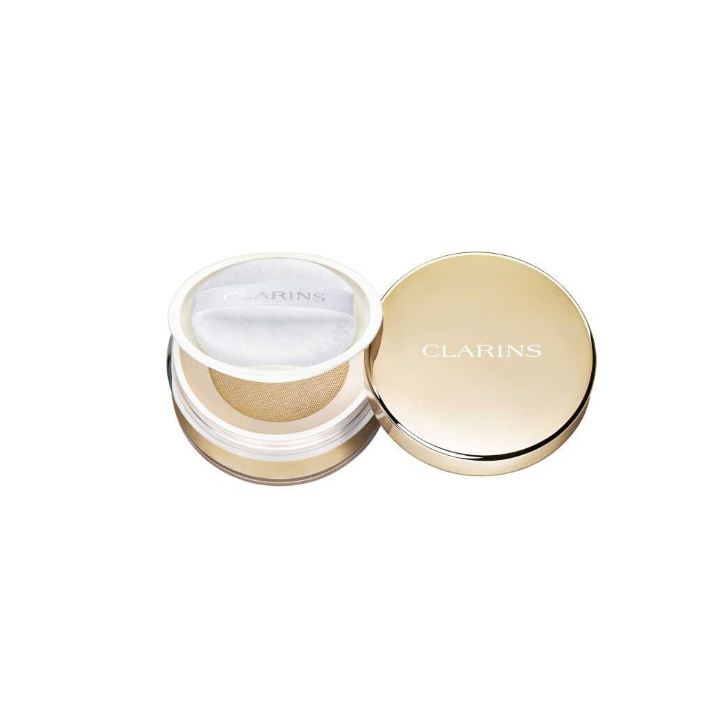Puderbehälter, geöffnet. Goldfarbener Deckel mit Schriftzug CLARINS. Puder und Applikator sichtbar.