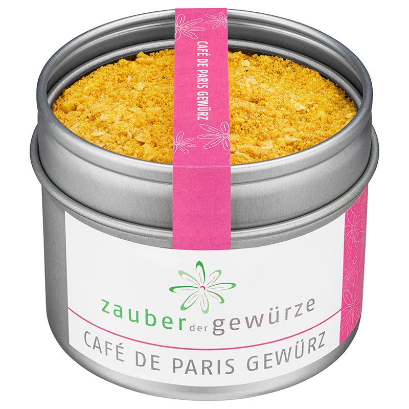 Gewürzdose mit rosa Etikett und Aufschrift. Deckel offen, Inhalt sichtbar. Marke: Zauber der Gewürze Café de Paris Gewürz.