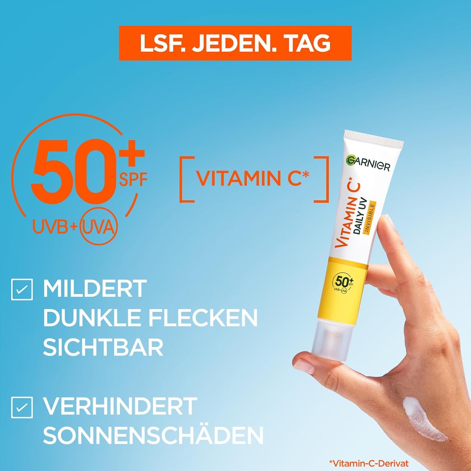 Hand hält Tube Garnier Vitamin C Daily UV Invisible. Text: 50+ SPF, Vitamin C, mildert dunkle Flecken, verhindert Sonnenschäden.