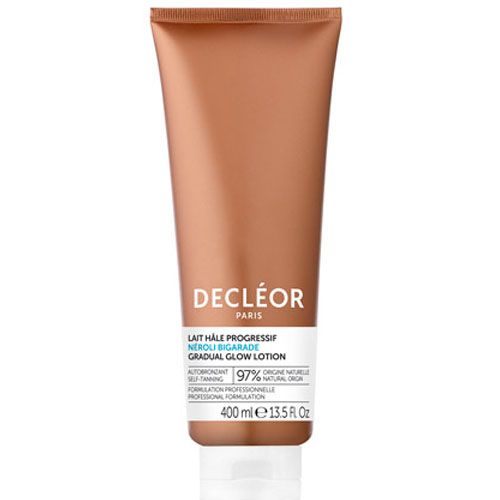 Bräunungslotion in einer braunen Tube. Aufschrift: DECLÉOR PARIS, LAIT HALE PROGRESSIF, GRADUAL GLOW LOTION. 400 ml.