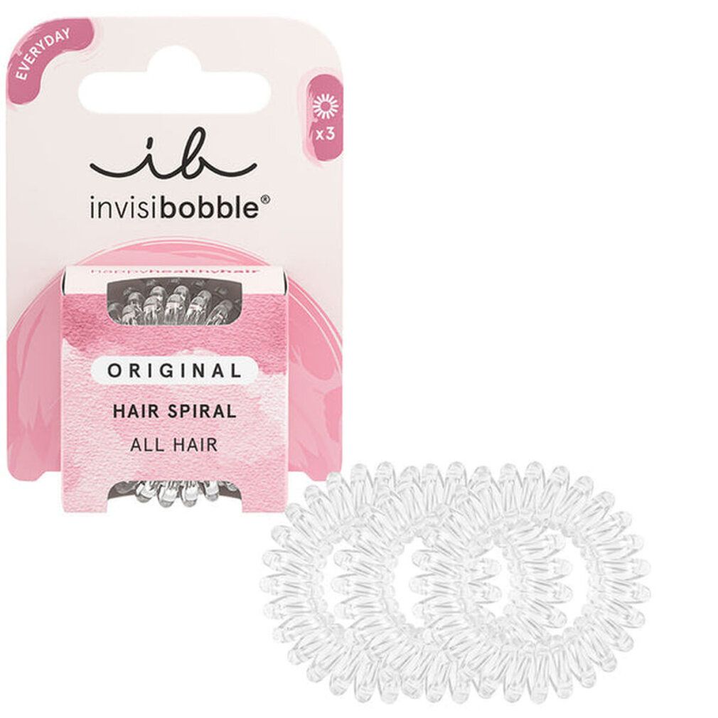 Drei transparente Haargummis neben einer Verpackung mit drei Haargummis. Verpackung mit Schriftzug 'ib invisibobble'.
