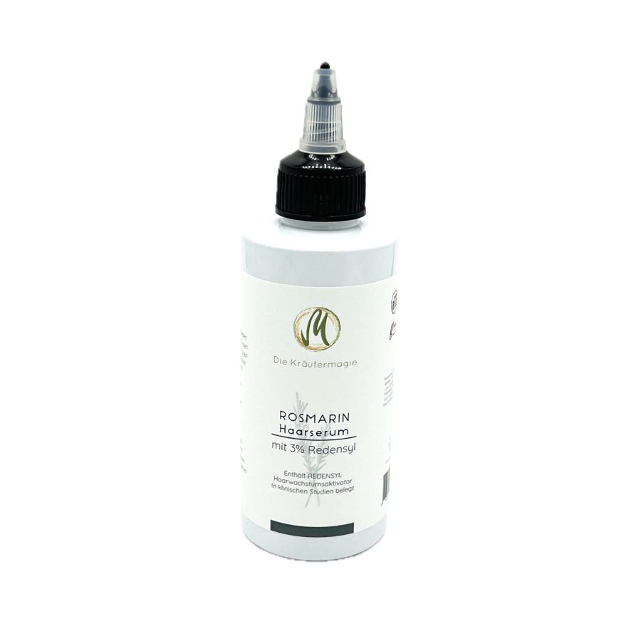 Flasche mit Applikator-Verschluss. Beschriftung: Rosmarin Haarserum mit 3% Redensyl.