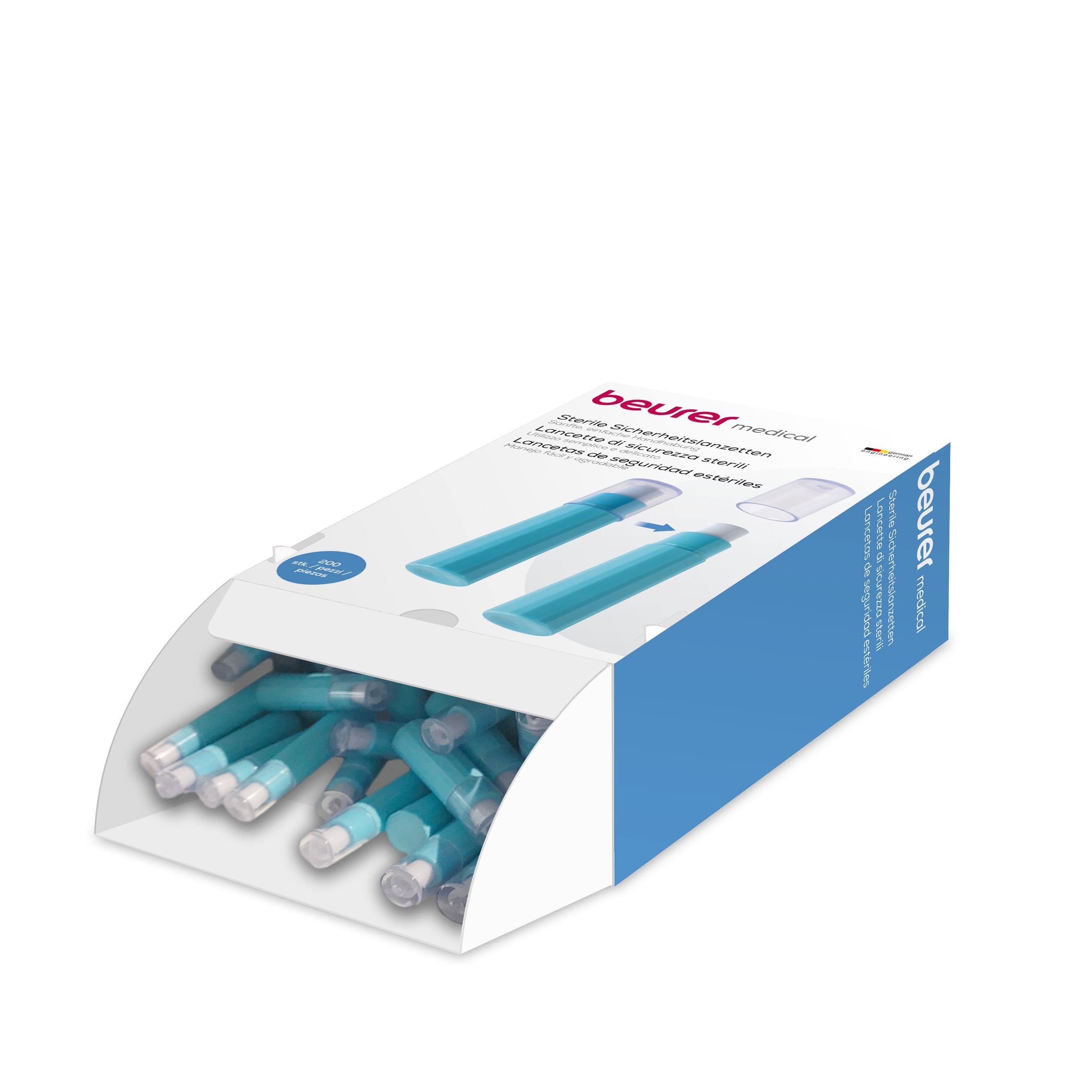 Geöffnete Verpackung mit blauen Lanzetten. Auf der Verpackung steht "beurer medical" und "sterile Sicherheitslanzetten".