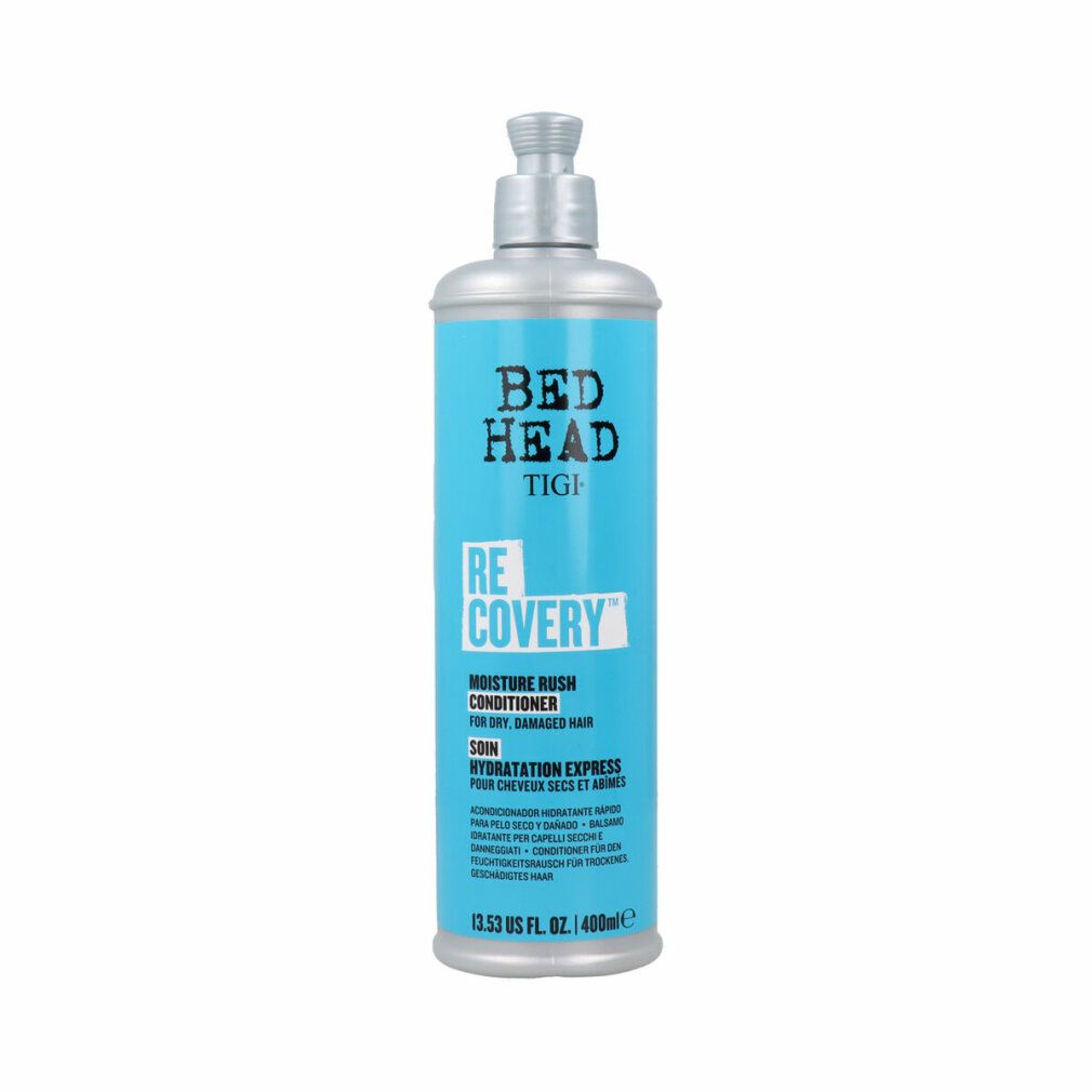 Flasche mit blauem Etikett. Aufschrift: Bed Head, TIGI, Recovery. Feuchtigkeitspflege für trockenes, strapaziertes Haar. 400ml.