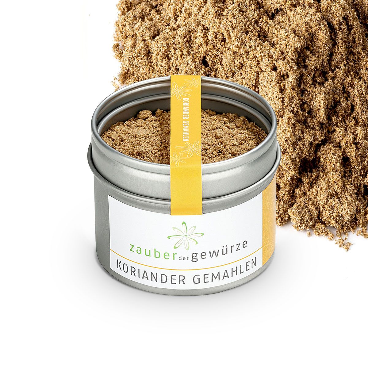 Gemahlener Koriander in Dose, daneben Korianderpulver. Gelbes Etikett mit Schriftzug: Zauber der Gewürze Koriander gemahlen.