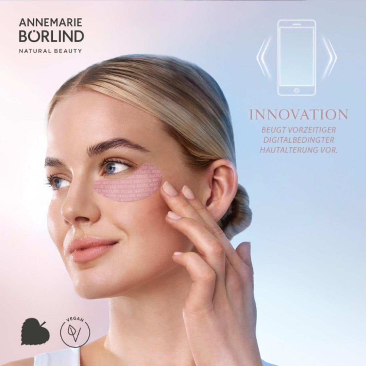 Rosa Augenpads-Verpackung. Marke: ANNEMARIE BÖRLIND. Text: ROSE NATURE, COOLING EYE PADS, 2 Stück.