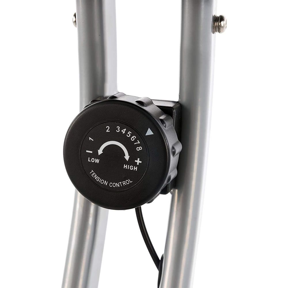 Einstellrad für den Widerstand. Schwarzes Rad mit Zahlen und Beschriftung 'TENSION CONTROL'.