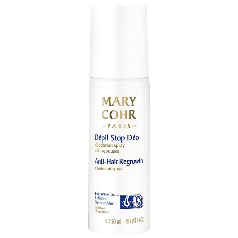 Weißes Spray von Mary Cohr Paris. Aufschrift: Dépil Stop Déo, Anti-Hair Regrowth. Mit Inhaltsangaben und Logo.
