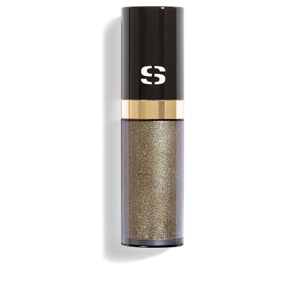Sisley Ombre Eclat Liquide. Zylindrische Flasche mit schwarzem Deckel und goldenem Ring. Glitzernde, goldfarbene Flüssigkeit.