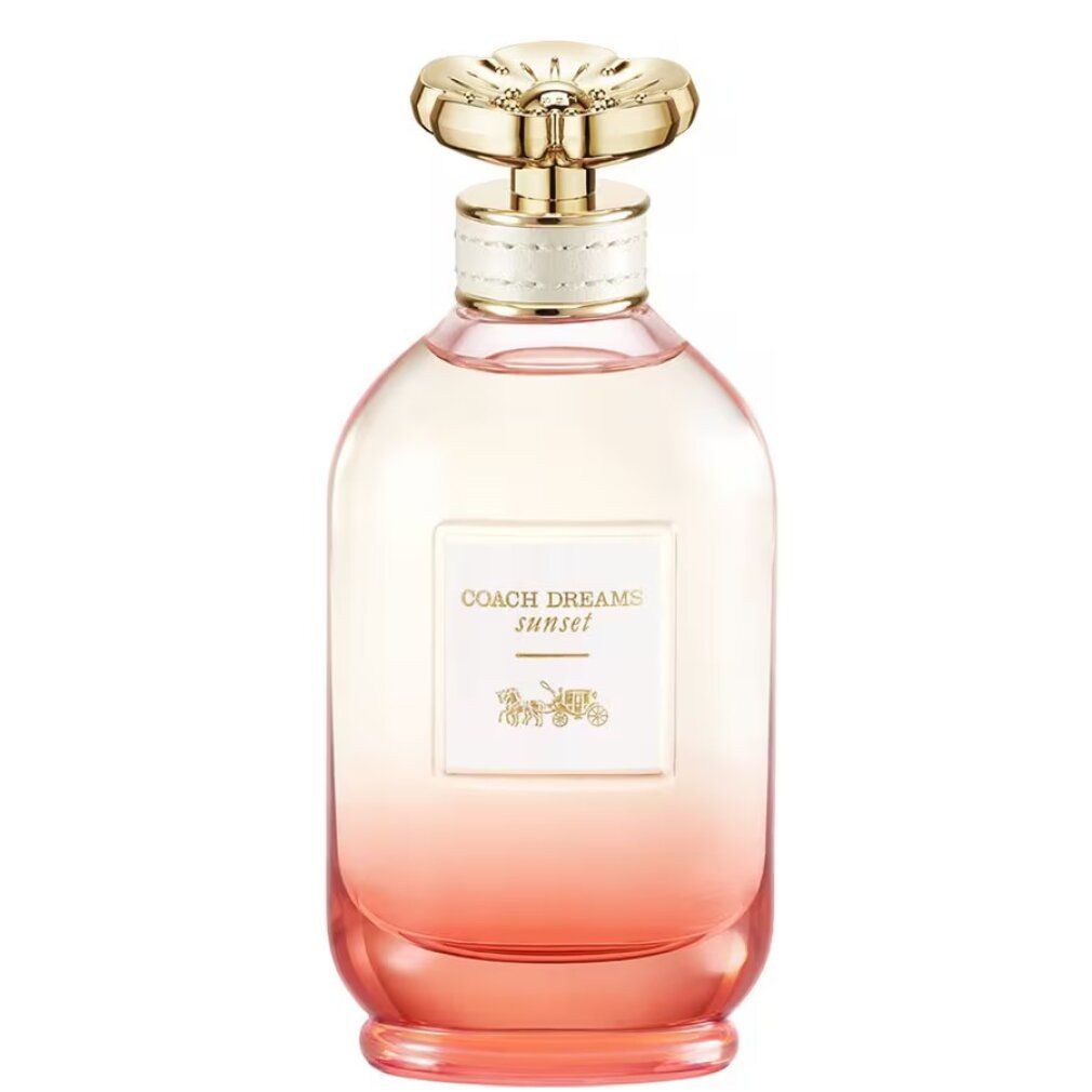 Parfümflasche mit goldfarbenem Deckel. Aufschrift: Coach Dreams Sunset. Farbverlauf von rosa nach orange.