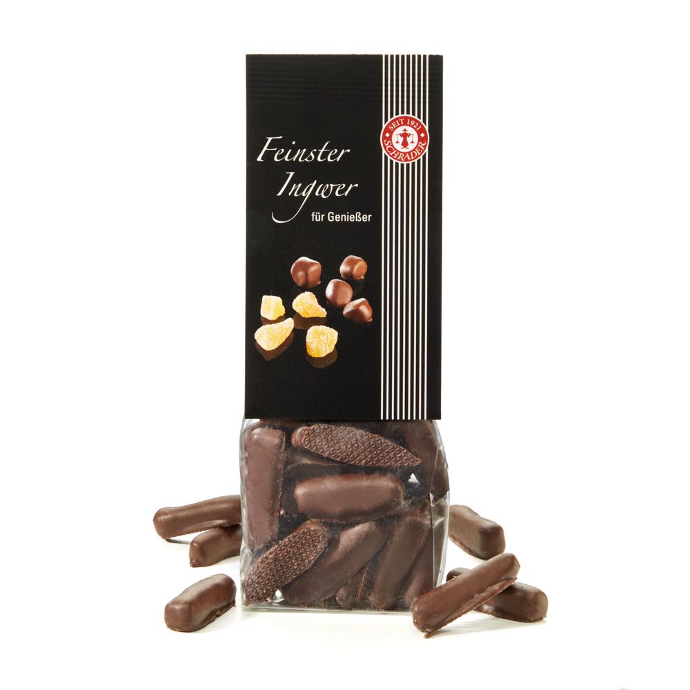 Zartbitterschokolade-Stäbchen, teilweise mit Waffelstruktur, in transparenter Verpackung. Schwarze Verpackung mit Schriftzug "Feinster Ingwer".