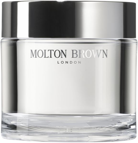 Glasbehälter mit silbernem Deckel. Aufschrift: Molton Brown London. Enthält eine weiße Creme.