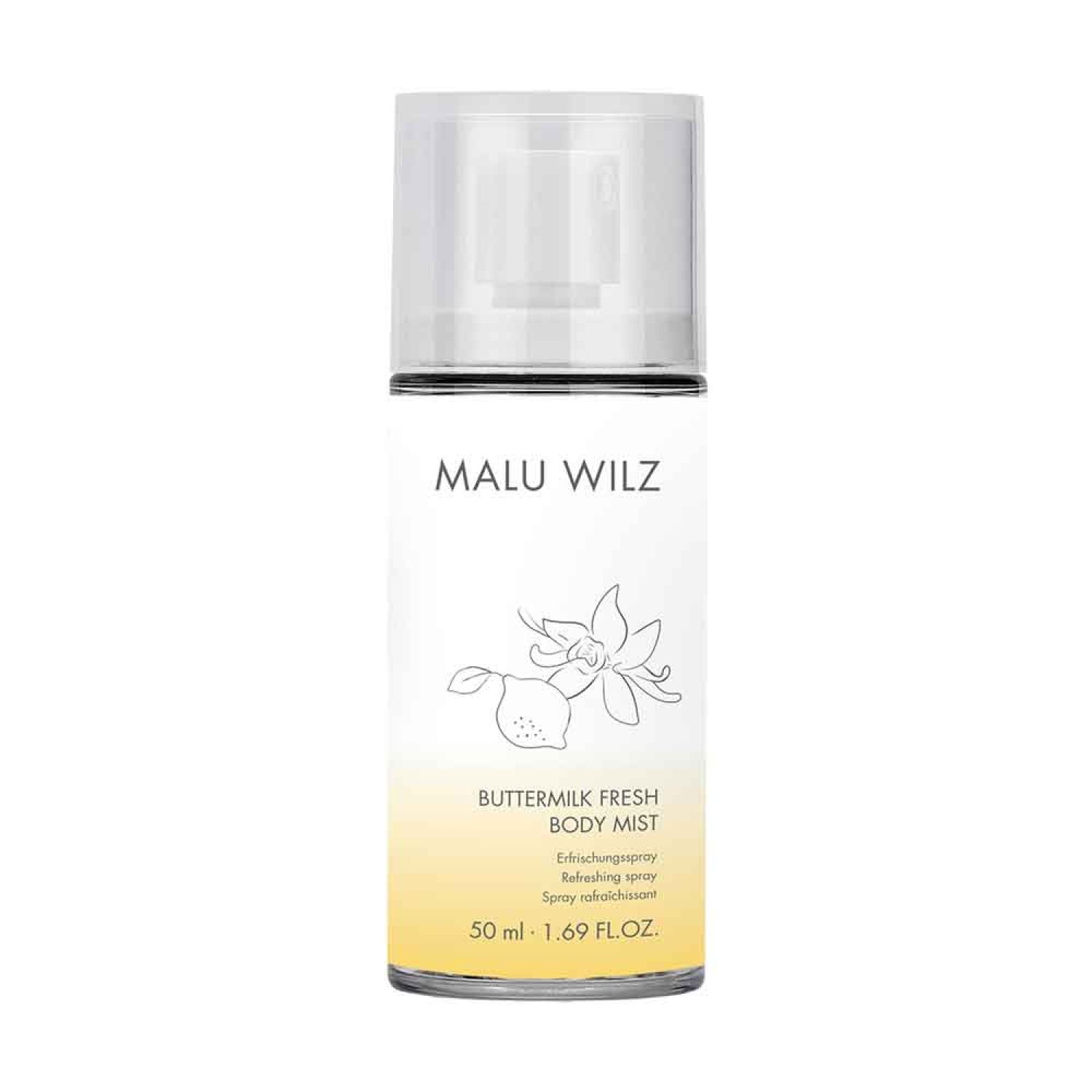 Körperpflegespray mit Sprühkopf. Aufschrift: Malu Wilz, Buttermilk Fresh Body Mist. Illustration: Zitrone und Blüte. Untertitel: Erfrischungsspray.
