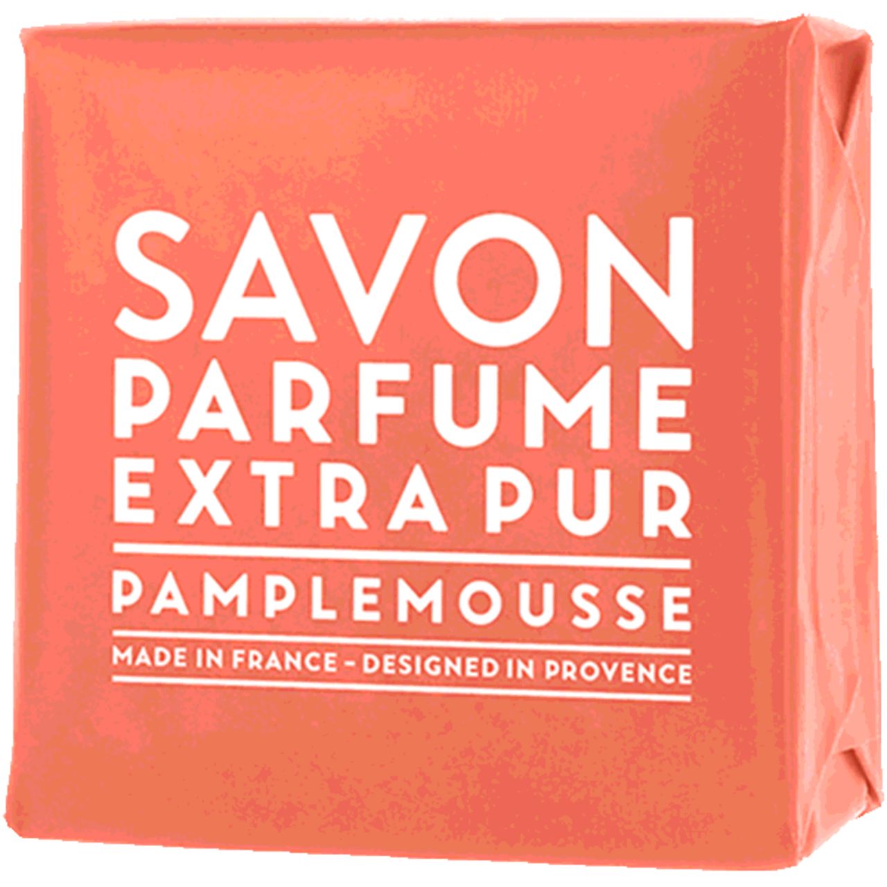 Rosa Seife in quadratischer Verpackung. Text: SAVON PARFUME EXTRA PUR PAMPLEMOUSSE. Hergestellt in Frankreich.