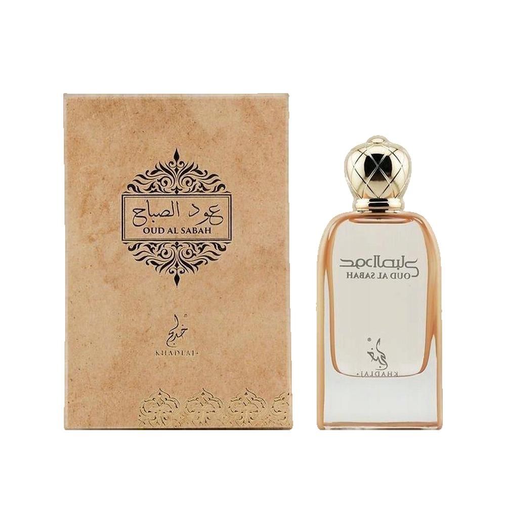 Parfümflakon und Verpackung. Beige-braune Verpackung mit arabischer Schrift. Goldfarbener Flakon mit goldfarbenem Deckel.