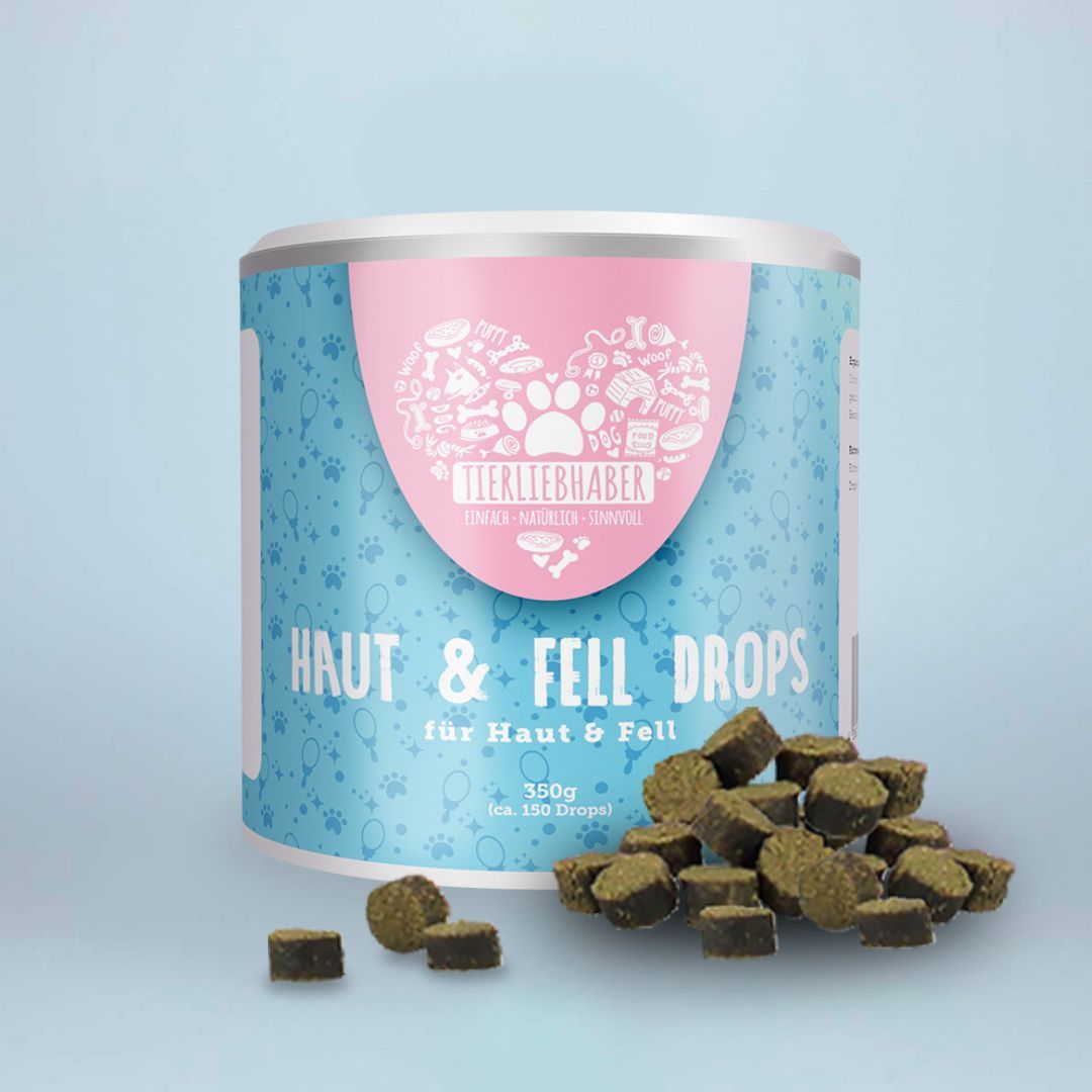 Dose "Haut & Fell Drops" mit grünen Drops. Hellblauer Hintergrund. Rosa Herz-Logo. 350g, ca. 150 Tropfen.