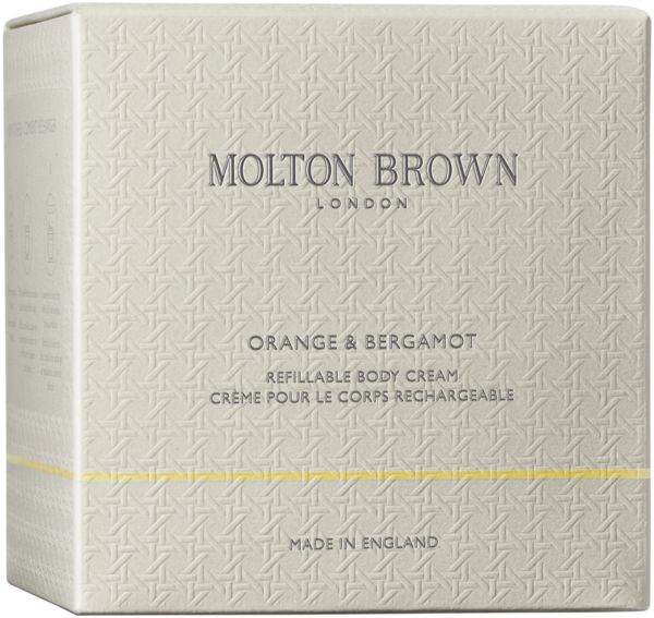 Glasbehälter mit silbernem Deckel. Aufschrift: Molton Brown London. Enthält eine weiße Creme.