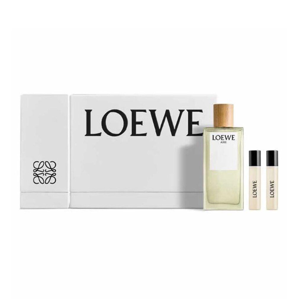 Weißer Karton mit LOEWE-Logo, Flakon und zwei Proben. Flakon mit Holzverschluss, helle Flüssigkeit. Proben mit schwarzem Deckel.