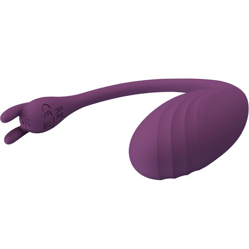 Lila Vibrator mit geriffelter Oberfläche und zwei abgerundeten Enden. CE-Kennzeichnung ist sichtbar.
