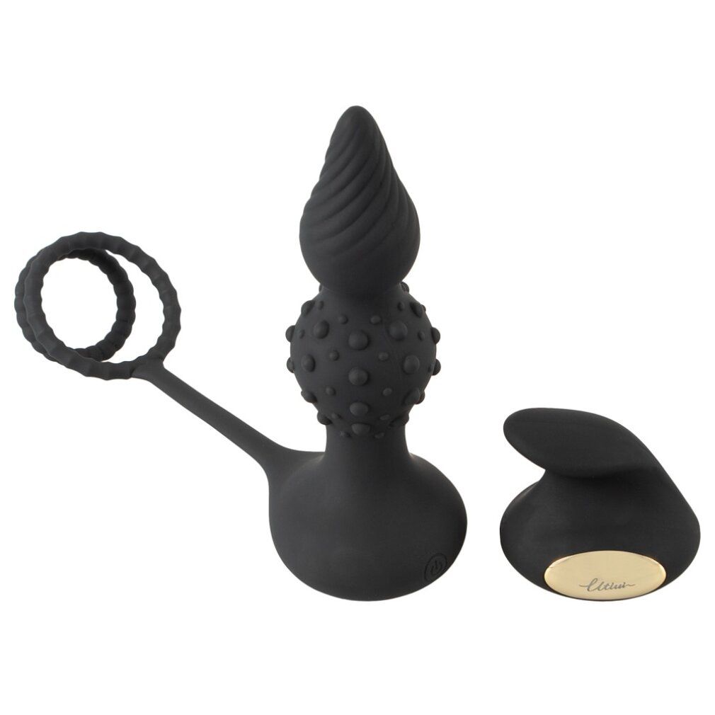 Schwarzes Wellness-Produkt mit Penisring und separatem Aufsatz. Mit strukturierten Oberflächen.