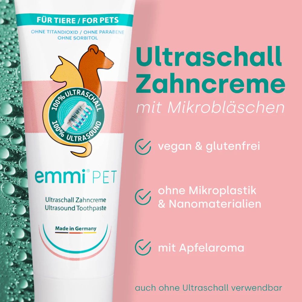 Zahnpasta-Tube mit Text: Ultraschall Zahncreme mit Mikrobläschen. Vegan, glutenfrei, ohne Mikroplastik, mit Apfelaroma.